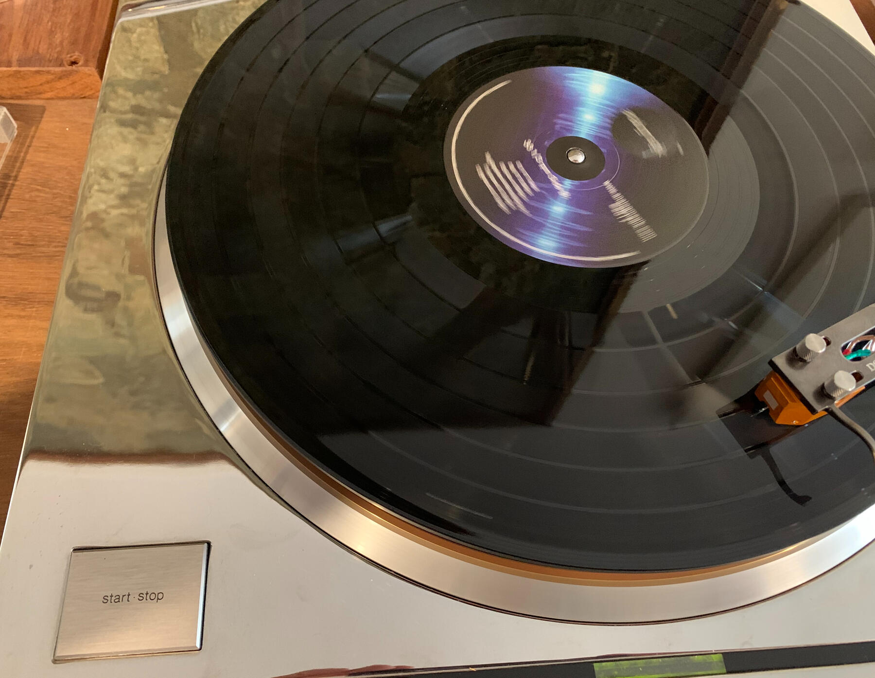 Image of vinyl record on a turntable.